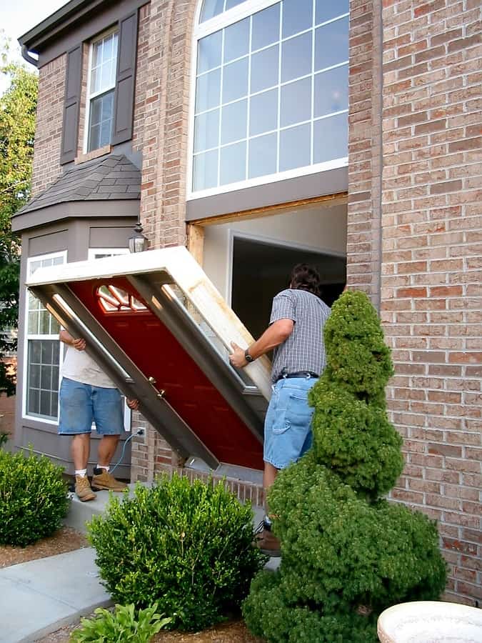 bigstock-New-Entry-Door-Installation-69853.jpg