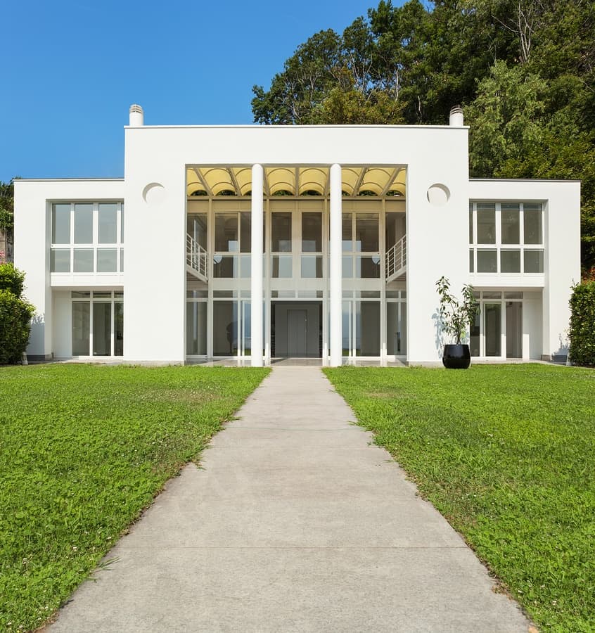 bigstock-green-garden-of-a-white-modern-97160699.jpg